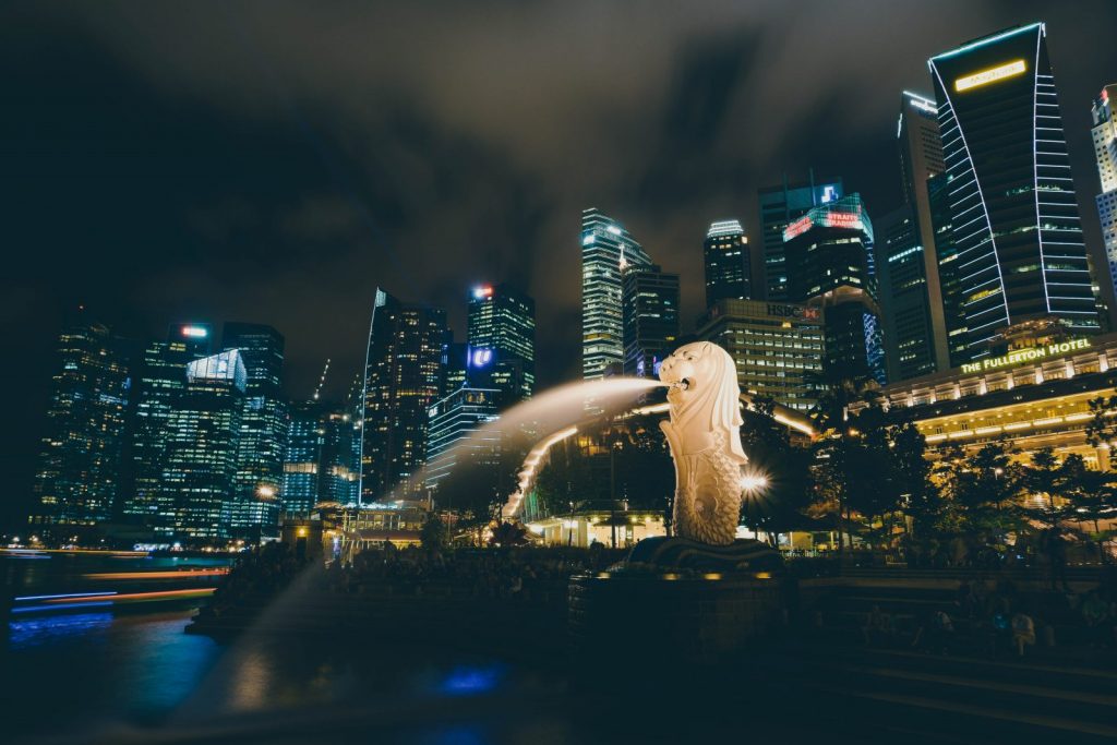 Skyline of Singapore's business district plus merlion fountain