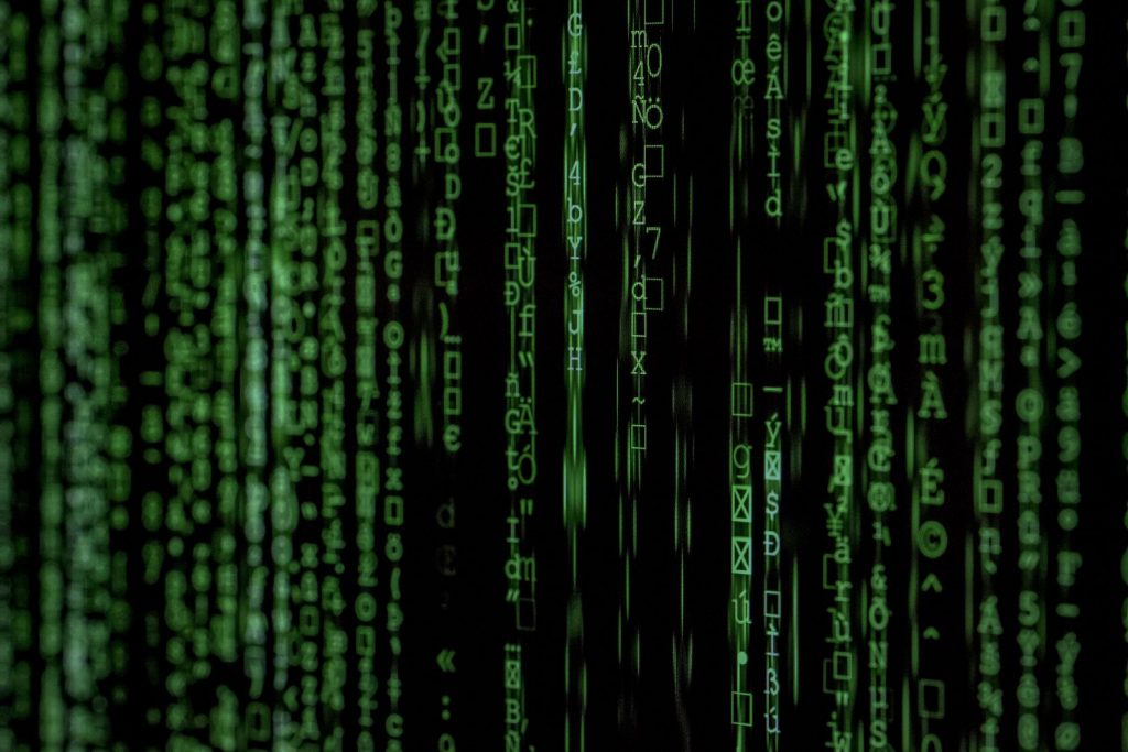 Strings of green binary code.